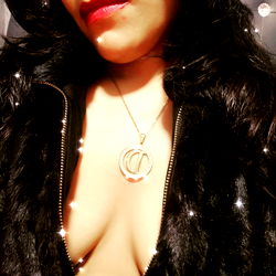 Vibrant Vixen in a Zippered Jacket and Jewelry, Celebrating Her Birthday with OnlyFans!