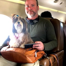 Paul Brown, Miami Model with Dog on Plane