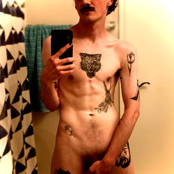 OnlyFans Model Ady Shows Off Inked, Muscular Physique in Bathroom