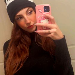 Alaska, Colorado Model in Black Sweater and Knee High Boots