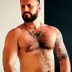 AustinCub, OnlyFans Model, Showcasing a Chest Tattoo and Body Hair
