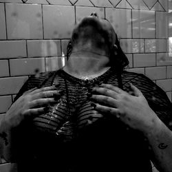 An Onlyfans Model in a Public Restroom