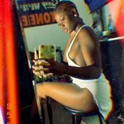 Attractive OnlyFans Model Jada Jones in a White Tankini Top