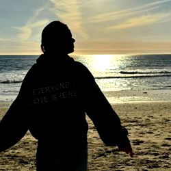 Embracing the Sunset at the Beach