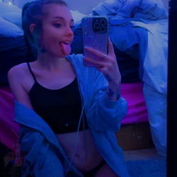 SkyyBlu, OnlyFans Model, Striking a Pose in Her Room