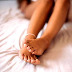 Ancherry: Intimate Moment on Bed