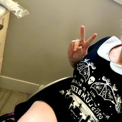 Blonde Woman Posing in Unconventional Tara Tara Shirt