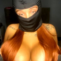 Amara in Black and Red Mask