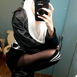 Astrid Lux, Fashionista in a Playful Cat Hat