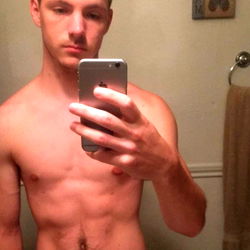 Emilio K., Shirtless Fitness Enthusiast Takes a Selfie in the Bathroom