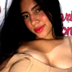 Natasha, a Medellín-born beauty with striking features and captivating allure.