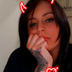 Mysterious Tattooed Woman in Black