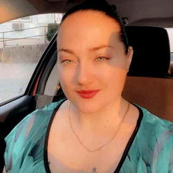 Woman Posing in Car for Selfie