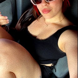 Model Zoe Posing in Car