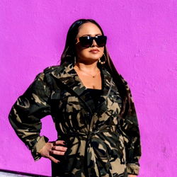 Fashionable Female Model in Camouflage Coat
