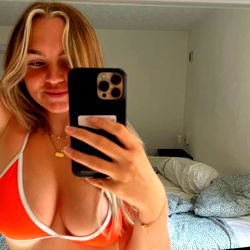 MichelleHauge - Bikini-clad model taking selfie in bedroom