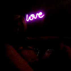 OnlyFans Model Ally Paige with Love Sign in Background