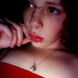 Tattooed Woman with Piercings