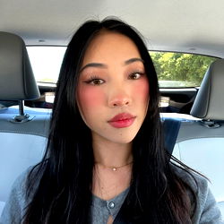 Woman with Asian Features in Car