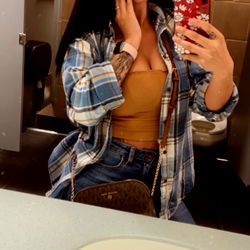 Arianna Jones in a Public Restroom Mirror