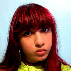 Stylish Violet, a Florida native with vibrant hair and fashion sense.