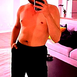 A fit individual in a modern home gym