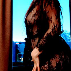 OnlyFans model FairyGinger in black lace dress