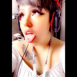 Playful OnlyFans Model Baby Bug Striking a Pose with Her Tongue Out