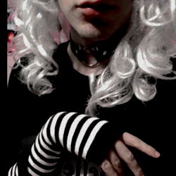 Emo Style with Face Paint and Black Hair,