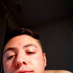 AJ, a young man with thoughtful expression