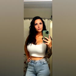 Ally, the OnlyFans model taking a selfie