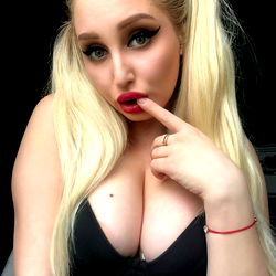 Sexy OnlyFans Model Suzie Posing with Finger in Mouth