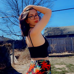 Woman in Colorful Print Pants and Tank Top