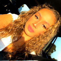 Nova Posing for the Camera in a Vehicle