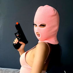 Model So Yun Lee in a Pink Mask with Gun
