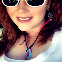 Smiling Woman in White Sunglasses and Necklace