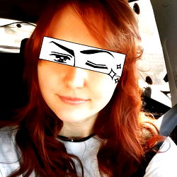 Red-haired woman with a playful photo filter