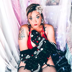 Seductive OnlyFans Model in Lingerie and Tattoos