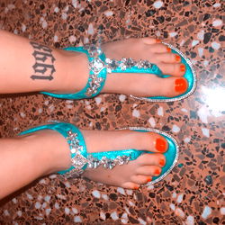 Candy Bellucci's Colorful Footwear and Tattoos