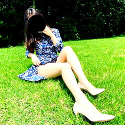 Akemii posing in a park