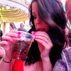 OnlyFans Model Blackheartscarlet Enjoying a Drink in a Casual Setting