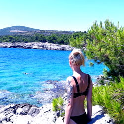 Angelica relaxing by the sea