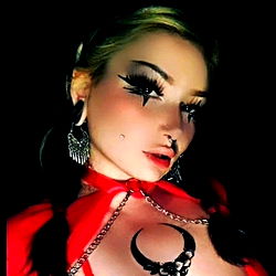 Seductive OnlyFans Model in a Stylish Shoot with Tattoos and Body Jewelry