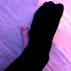 iQboi Model in Unique Sock Photo