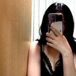 Model 1 posing with phone