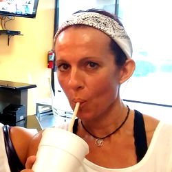 Woman Enjoying a Cold Drink