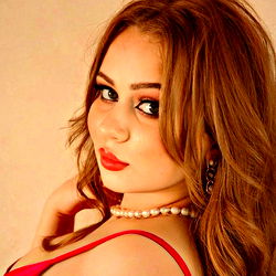 Sultry OnlyFans Model Striking a Pose in Red