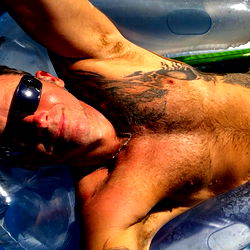 Ausman13 in a poolside recliner