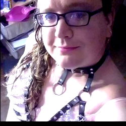 Vogue Female Model Posing in BDSM Attire