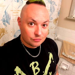 Flyzik's Unique Tattoo and Shaved Hair